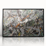Framed abstract wall art featuring colorful splatter designs on an acrylic surface, showcasing a modern aesthetic with a sleek black frame.