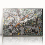 Framed abstract wall art showcasing vibrant splatter designs in a modern silver frame, perfect for adding a stylish touch to any decor.