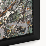 Vibrant abstract splatter wall art featuring a colorful array of paint drips and splashes, beautifully framed for an artistic touch.