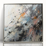 Framed abstract wall art with colorful splatter designs, featuring a sleek silver frame, ideal for modern home decor and artistic flair.