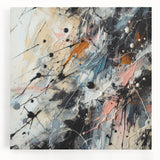 Colorful abstract splatter wall art on stretched canvas, showcasing vibrant hues and dynamic patterns, perfect for modern home decor.