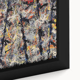 Close-up of a framed abstract splatter wall art design, showcasing vibrant colors and dynamic textures in a modern aesthetic setting.