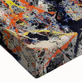 Close-up of an abstract splatter design on stretched canvas wall art, showcasing vibrant colors and dynamic patterns, perfect for modern decor.