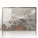 Framed abstract wall art showcasing vibrant strokes and lines in silver and black hues, adding a modern touch to any interior decor.