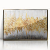 Framed wall art featuring an abstract design of colorful strokes and lines in shades of gold, blue, and white, enhancing contemporary decor.