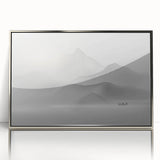 Framed abstract wall art featuring dynamic strokes and lines in silver and gray tones, adding contemporary flair to any space.
