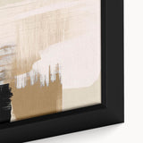 Close-up of framed abstract wall art featuring vibrant strokes and lines in blue, yellow, and pink, perfect for modern home decor.
