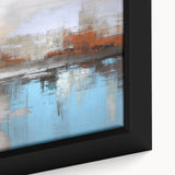 Abstract wall art featuring vibrant strokes and lines in shades of blue, orange, and yellow, elegantly framed to enhance modern decor.