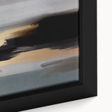 Close-up of a framed canvas wall art piece showcasing vibrant abstract strokes and lines in blue, orange, and yellow tones, adding modern decor flair.