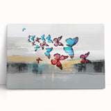 Abstract canvas wall art showcasing vibrant strokes and lines in shades of blue, orange, and yellow, adding a modern touch to any decor.