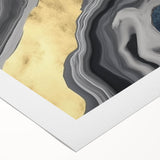 Abstract wall art featuring colorful strokes and lines on a rolled canvas, showcasing vibrant hues of blue, orange, and yellow for modern decor.