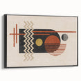 Framed abstract wall art featuring colorful strokes and lines on canvas, displayed in a sleek black frame, perfect for modern decor.