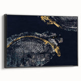 Framed abstract wall art showcasing a dynamic design of colorful strokes and lines, featuring a sleek black frame and side view.
