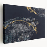 Abstract wall art featuring vibrant strokes and lines in shades of blue, gold, and black on stretched canvas, ideal for modern decor.