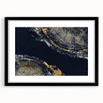Framed abstract wall art featuring colorful strokes and lines in a modern design, set against a black mat, perfect for contemporary decor.