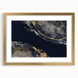 Framed wall art showcasing an abstract design of colorful strokes and lines, featuring a gold mat and a sleek black frame, perfect for modern decor.
