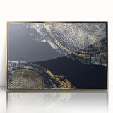Framed wall art showcasing an abstract design with gold strokes and lines on an acrylic surface, ideal for modern home decor.