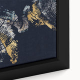 Close-up of an abstract wall art piece showcasing a vibrant design with dynamic strokes and lines in shades of blue, yellow, and pink, framed for display.