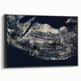 Framed canvas wall art showcasing an abstract design of strokes and lines in black and white, displayed in a modern setting, enhancing contemporary decor.