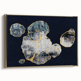 Framed canvas wall art showcasing an abstract design with gold strokes and lines, set against a neutral background, perfect for modern home decor.