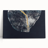 Abstract wall art design featuring vibrant strokes and lines in blue, orange, and yellow hues, printed on stretched canvas and leaning against a neutral wall, ideal for modern home decor.