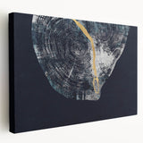 Abstract wall art featuring colorful strokes and lines on a stretched canvas, showcasing a modern design in a side view, ideal for contemporary decor.