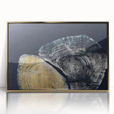 Framed wall art showcasing an abstract design of gold strokes and lines on a white background, perfect for modern decor. Elevate your space with this elegant piece.