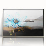 Framed abstract wall art featuring dynamic strokes and lines in silver and blue tones, perfect for modern decor in living spaces.