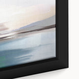 Close-up of an abstract wall art design showcasing vibrant strokes and lines in shades of blue, orange, and yellow, elegantly framed for modern decor.