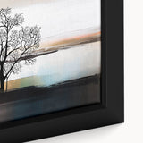 Close-up of a framed abstract wall art piece showcasing vibrant strokes and lines in shades of blue, orange, and yellow, perfect for modern decor.