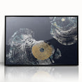 Framed wall art featuring an abstract design of colorful strokes and lines, encased in a sleek black frame, perfect for modern home decor and artistic aesthetics.