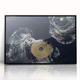 Framed wall art featuring an abstract design of colorful strokes and lines, encased in a sleek black frame, perfect for modern home decor and artistic aesthetics.