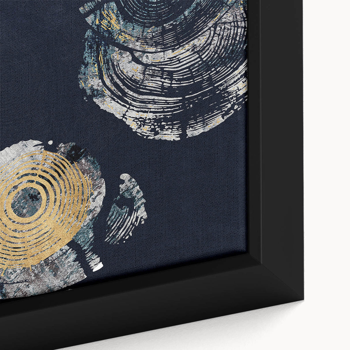 Close-up of a framed canvas wall art piece showcasing an abstract design with vibrant strokes and lines in shades of blue, orange, and cream, perfect for modern decor.