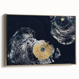 Framed canvas wall art featuring an abstract design of gold strokes and lines, showcasing a modern aesthetic suitable for contemporary home decor. The artwork is elegantly displayed from a side view, emphasizing its sleek frame and vibrant colors, perfect for enhancing any living space's ambiance.