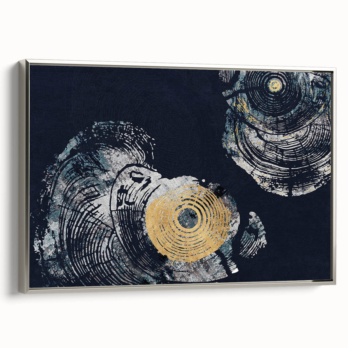 Framed canvas wall art showcasing an abstract design of colorful strokes and lines, featuring a sleek silver frame, perfect for modern home decor.