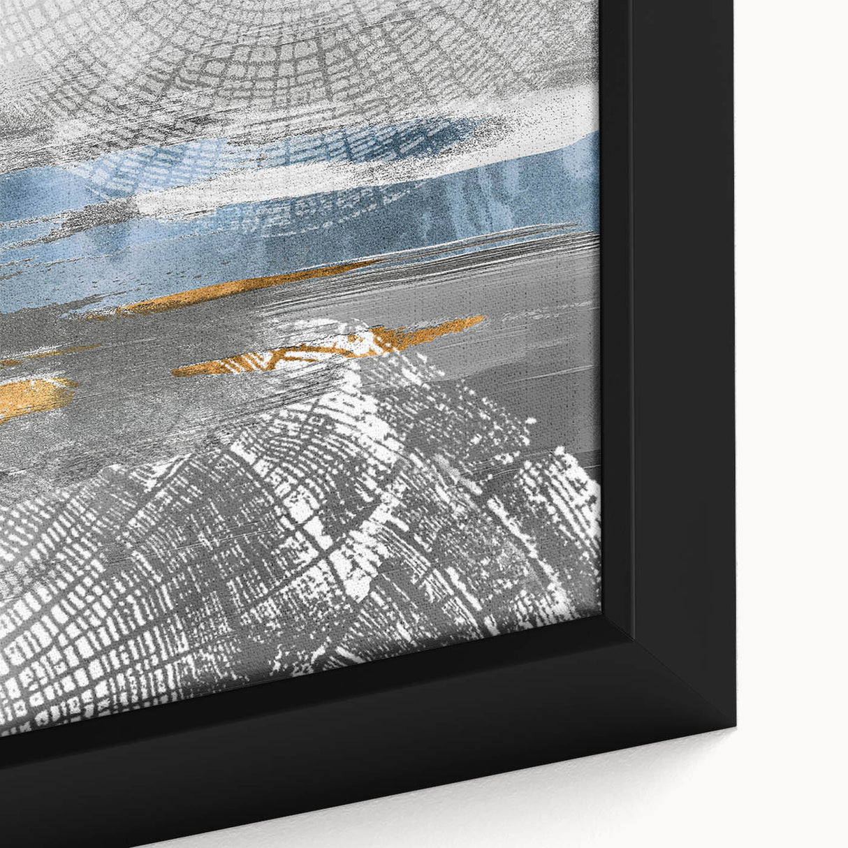 Close-up of an abstract wall art piece showcasing vibrant strokes and lines in blue, orange, and yellow, framed for modern decor.