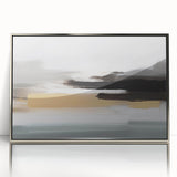Framed abstract wall art featuring dynamic strokes and lines in shades of gray and silver, adding a modern touch to any decor.