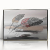 Framed abstract wall art featuring vibrant strokes and lines in silver and blue hues, perfect for modern decor in living spaces.