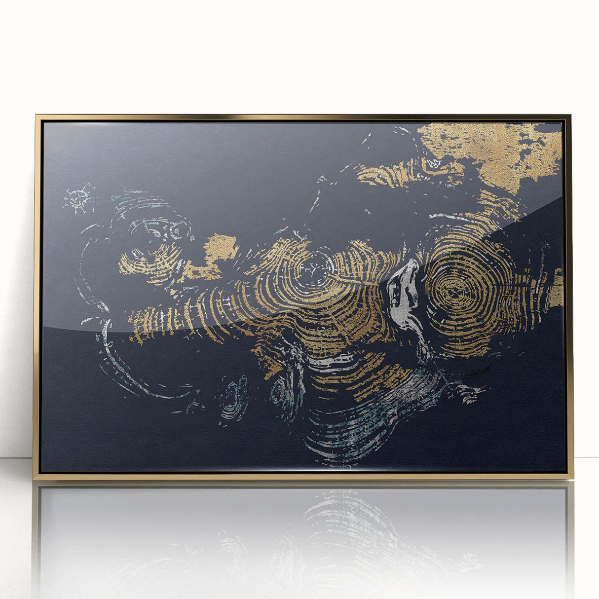 Framed abstract wall art featuring dynamic gold strokes and lines on a sleek acrylic surface, ideal for modern decor and enhancing interior aesthetics.