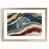 Abstract strokes and lines in muted tones create a modern wall art piece, framed in silver with a mat, perfect for contemporary home decor.