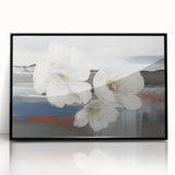 Framed wall art featuring an abstract design of colorful strokes and lines, presented in a sleek black frame, ideal for modern home decor.