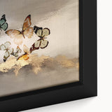 Close-up of a framed abstract wall art design showcasing vibrant strokes and lines in shades of blue, orange, and yellow, ideal for modern home decor.