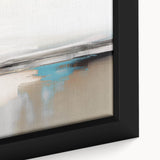 Abstract wall art featuring vibrant strokes and lines in shades of blue, orange, and yellow, showcasing modern artistic design elements on a framed canvas.