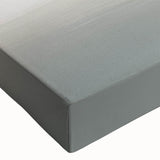 Close-up view of an abstract wall art canvas featuring colorful strokes and lines, showcasing vibrant hues of blue, pink, and gold on a textured surface, ideal for modern decor.