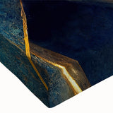 Abstract wall art close-up showcasing vibrant strokes and lines in bold colors on a stretched canvas, perfect for modern decor.