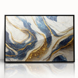 Framed abstract wall art featuring vibrant strokes and lines in black and white, adding a modern touch to any interior decor.