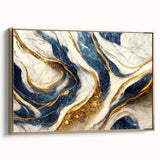 Framed abstract wall art featuring dynamic strokes and lines in gold and black, showcasing modern design elements for stylish decor.