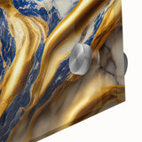 Close-up of an abstract wall art piece with vibrant strokes and lines in shades of blue, orange, and yellow, showcasing modern artistic flair.