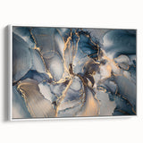 Framed wall art showcasing an abstract design of colorful strokes and lines on a white canvas, adding a modern touch to any decor.
