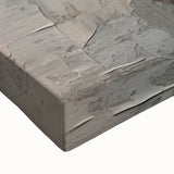 Close-up of a stretched canvas showcasing an abstract design of colorful strokes and lines, ideal for modern home decor and wall art collections.